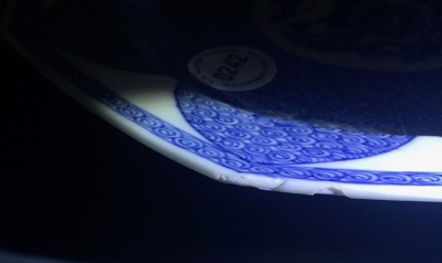 A Chinese octagonal blue and white plate with the arms of &lsquo;de Haze&rsquo;, Yongzheng/Qianlong