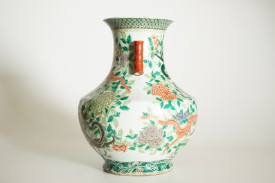 A large Chinese famille verte hu-shaped &quot;Dragon&quot; vase, 19th C.