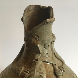 An stoneware pointed nose jug with a bagpipe player, Aachen or Raeren, 15/16th C.