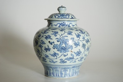 A Chinese blue and white peony scroll vase and cover, Ming, Wanli