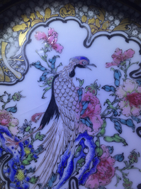 A fine Chinese famille rose and grisaille eggshell cup and saucer with a pheasant, Yongzheng