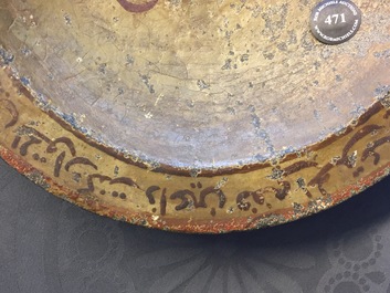 A low-fired carved stone Islamic calligraphy dish with a magic square, 16/17th C.