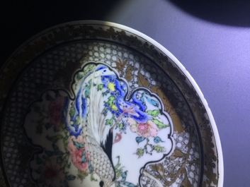 Une tasse et soucoupe en porcelaine de Chine famille rose et grisaille coquille d'oeuf &agrave; d&eacute;cor d'un faisan, Yongzheng