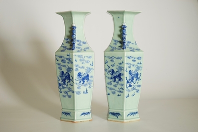 A pair of Chinese hexagonal blue and white on celadon ground vases with buddhist lions, 19th C.