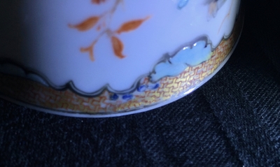 A Chinese famille rose cup and saucer with two egrets, Yongzheng