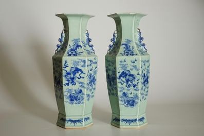 A pair of Chinese hexagonal blue and white on celadon ground vases with buddhist lions, 19th C.