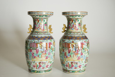 A pair of Chinese Canton famille rose and gilt vases, 19th C.