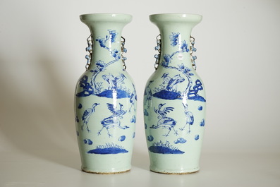 A pair of Chinese vases in blue and white on celadon ground with cranes, 19th C.