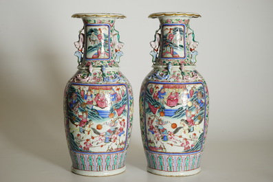 A pair of Chinese famille rose vases with court scenes, 19th C.
