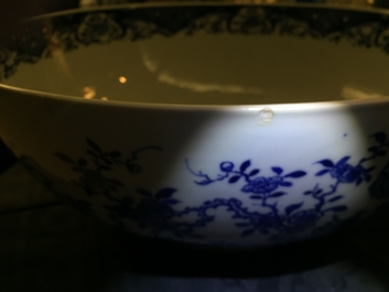 A large Chinese blue and white bowl with birds among blossoming flowers, Qianlong