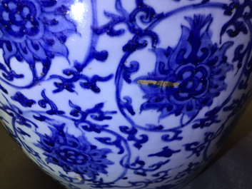 A Chinese blue and white lotus scroll vase, Ming, Wanli