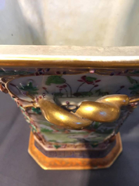 A pair of Chinese famille rose export bough pots with twisted handles and relief-decorated squirrels, Qianlong