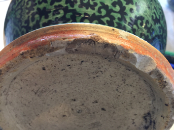 A rare Chinese verte-noire biscuit lotus scroll vase, Kangxi