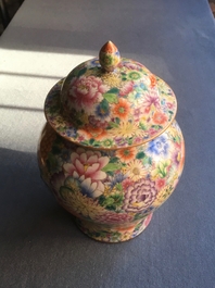 A Chinese millefleurs famille rose vase and cover, Qianlong mark, 20th C.