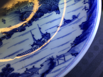 A very fine Chinese blue and white landscape plate, Kangxi, ca. 1670