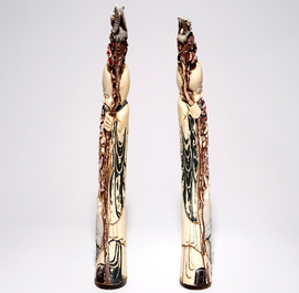 A pair of tall Chinese polychrome carved ivory figures of immortals, 19/20th C.