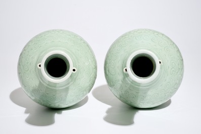 A pair of Chinese incised celadon-glazed arrowhead vases, 19th C.