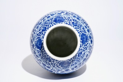 A Chinese blue and white peony scroll vase, 19th C.