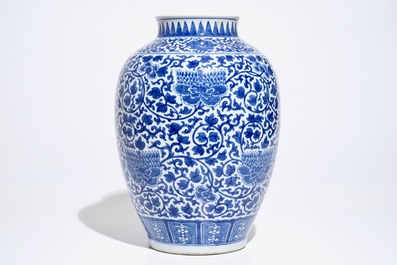 A Chinese blue and white peony scroll vase, 19th C.