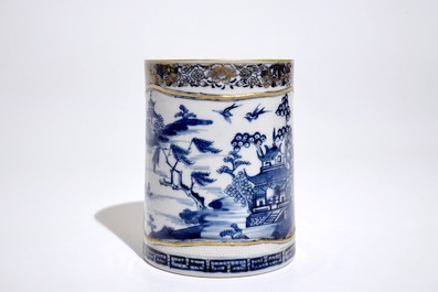 A Chinese blue, white and gilt tankard with relief design and twisted handle, Qianlong