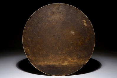 A round Chinese polychrome plaque with a landscape design, 19/20th C.