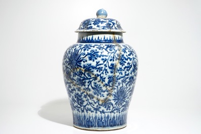 A large Chinese blue and white lotus scroll baluster vase and cover, Kangxi