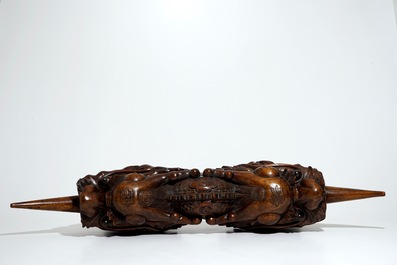 A Chinese carved wood figure of a two-headed dragon, 19/20th C.