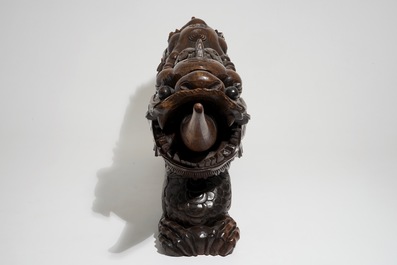 A Chinese carved wood figure of a two-headed dragon, 19/20th C.