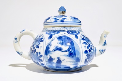 A Chinese blue and white teapot with figurative and floral panels, Kangxi