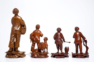 Four Chinese carved wood figures of working class people, Cultural Revolution