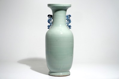 A tall Chinese blue and white celadon-ground vase with a dragon and a phoenix, 19th C.