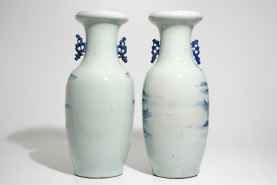 Two tall Chinese blue and white landscape vases, 19/20th C.