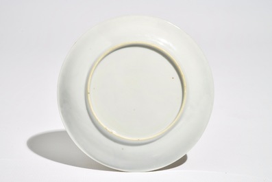 Une tasse et soucoupe en porcelaine de Chine &agrave; d&eacute;cor d'un paysage, Yongzheng