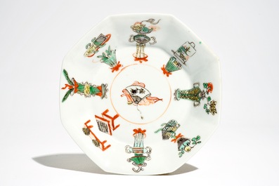 A Chinese famille verte caf&eacute; au lait-ground cup and saucer, Kangxi