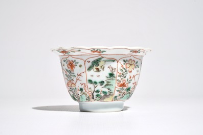 A Chinese famille verte cup and saucer with egrets, Kangxi