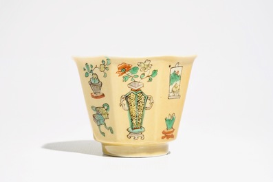 A Chinese famille verte caf&eacute; au lait-ground cup and saucer, Kangxi