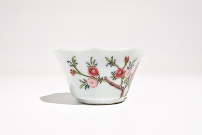 A Chinese famille rose cup and saucer with floral design, Yongzheng/Qianlong