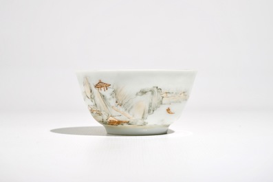 A Chinese grisaille and gilt cup and saucer with a fine landscape, Yongzheng
