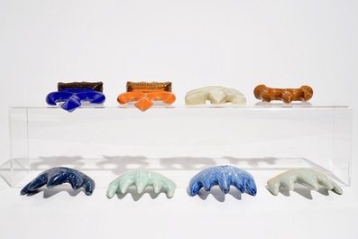 Eight various Chinese porcelain and hardstone brush rests, 19/20th C.