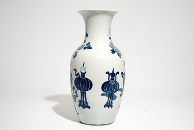 A Chinese blue and white vase with incense burners and furniture, 19/20th C.