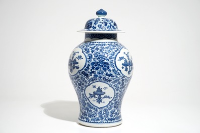 A Chinese blue and white baluster vase and cover, Kangxi
