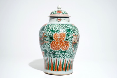 A Chinese wucai baluster vase and cover with phoenixes, Transitional period