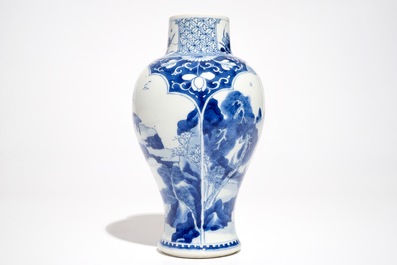 A Chinese blue and white baluster vase with landscape panels, Kangxi