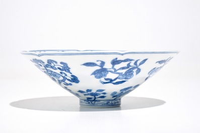 A Chinese blue and white bowl with flowers and fruits, 19th C.