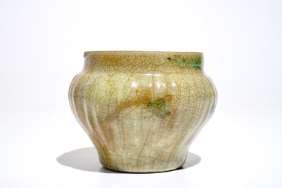 A Chinese Longquan celadon-ground crackle-glazed jar and two dishes, Ming
