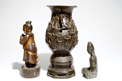 A large Chinese bronze vase on stand, a seated Guanyin and a gilt wood figure, Ming Dynasty