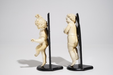 A pair of ivory models of putti, France, 18th C.