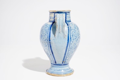 An Antwerp maiolica light blue ground wet drug jar, mid-16th C.