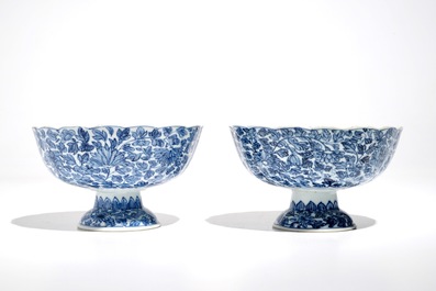 A pair of Chinese blue and white bowls on foot, Kangxi