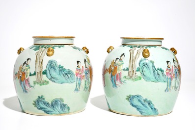 A pair of fine Chinese famille rose jars and covers with a fine design around, 19th C.